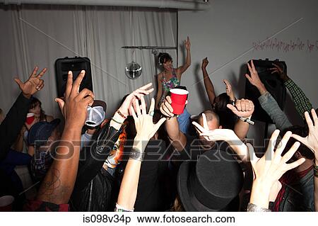 Stock Photography - People dancing at party. Fotosearch