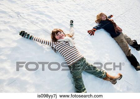 Children making snow angels View Large Photo Image Stock Image - Children making snow angels. Fotosearch