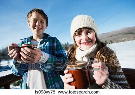 Children with hot drinks, portrait View Large Photo Image Stock Photography - Children with hot drinks, portrait. Fotosearch