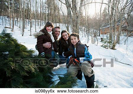 Family in snow, portrait View Large Photo Image Stock Photo - Family in snow, portrait. Fotosearch