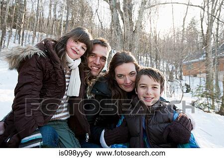 Family in snow, portrait View Large Photo Image Stock Photo - Family in snow, portrait. Fotosearch