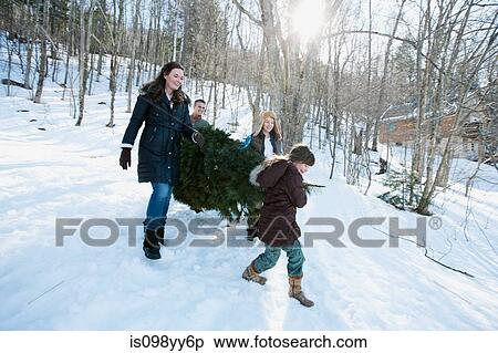 Family walking in snow View Large Photo Image Stock Photography - Family walking in snow. Fotosearch