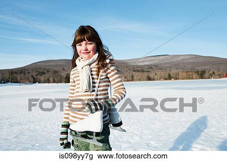 Girl with ice skates, portrait View Large Photo Image Stock Image - Girl with ice skates, portrait. Fotosearch