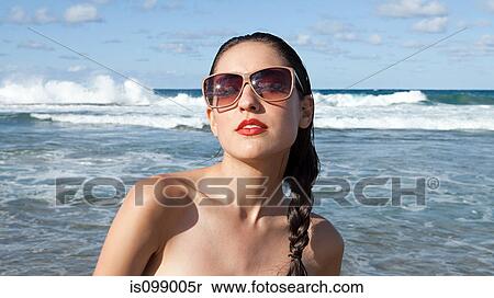 Woman on beach wearing sunglasses View Large Photo Image Stock Photography - Woman on beach wearing sunglasses. Fotosearch