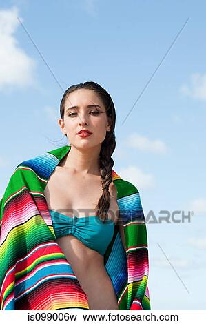 Woman wrapped in ethnic style blanket View Large Photo Image Stock Photo - Woman wrapped in ethnic style blanket. Fotosearch