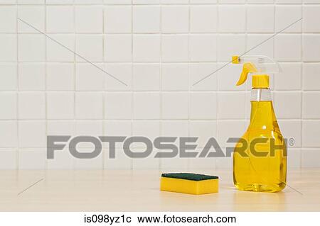 Bottle of yellow cleaning fluid and cleaning sponge View Large Photo Image Stock Image - Bottle of yellow cleaning fluid and cleaning sponge. Fotosearch