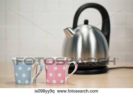 Kettle and tea cups View Large Photo Image Stock Photography - Kettle and tea cups. Fotosearch