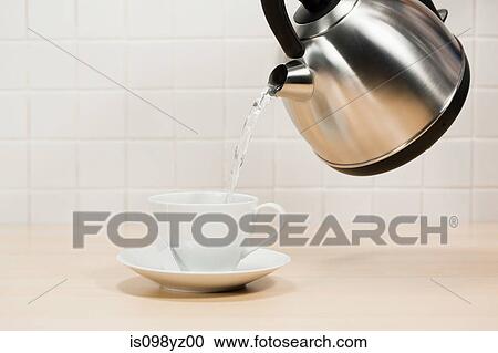 Making a cup of tea View Large Photo Image Stock Image - Making a cup of tea. Fotosearch