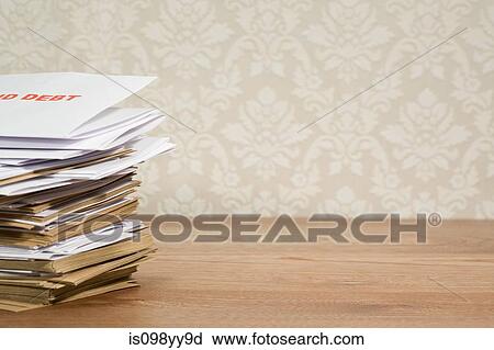 Stock Image - Pile of bills. Fotosearch