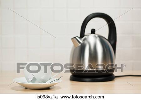 Teacup and kettle View Large Photo Image Stock Image - Teacup and kettle. Fotosearch