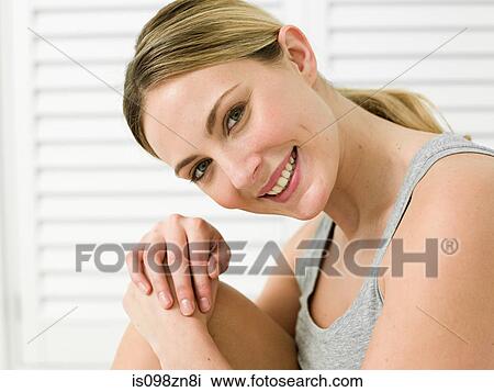 Portrait of young woman in bathroom View Large Photo Image Stock Image - Portrait of young woman in bathroom. Fotosearch