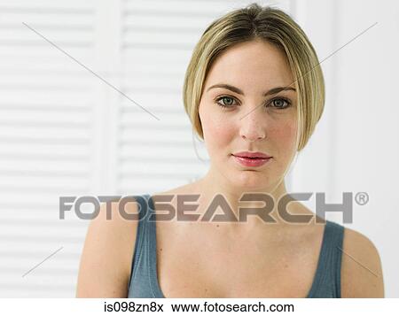 Portrait of young woman in bathroom View Large Photo Image Stock Photo - Portrait of young woman in bathroom. Fotosearch