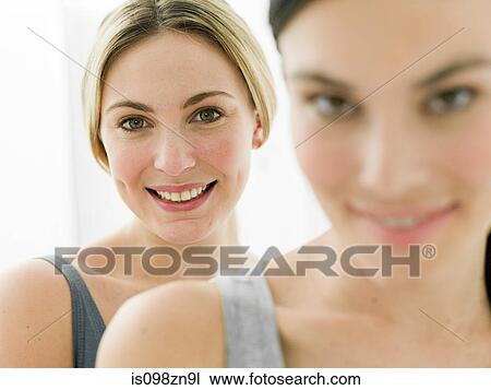 Portrait of young women in bathroom View Large Photo Image Stock Image - Portrait of young women in bathroom. Fotosearch