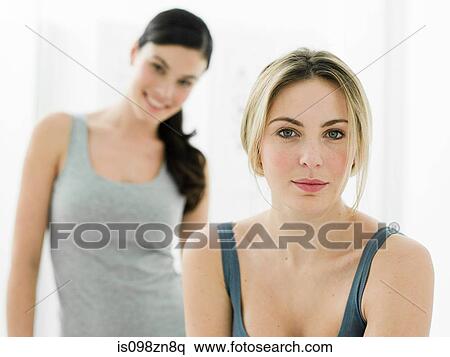 Portrait of young women in bathroom View Large Photo Image Stock Photography - Portrait of young women in bathroom. Fotosearch