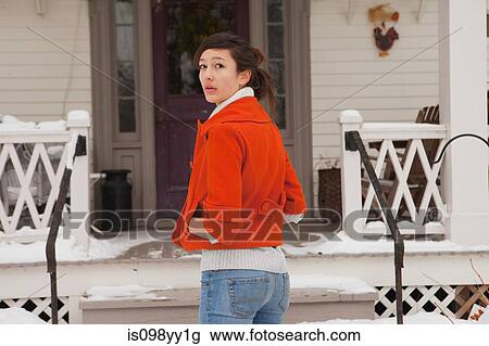 Teenage girl outside house, portrait View Large Photo Image Stock Image - Teenage girl outside house, portrait. Fotosearch