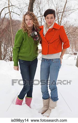 Teenage girls in snow, portrait View Large Photo Image Picture - Teenage girls in snow, portrait. Fotosearch