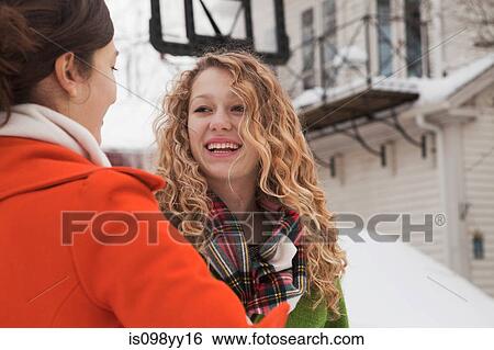 Teenage girls outside in the snow View Large Photo Image Stock Photograph - Teenage girls outside in the snow. Fotosearch