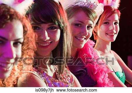 Stock Image - Four young women on hen night. Fotosearch