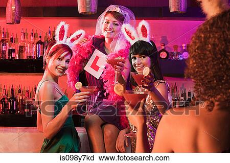 Four young women on hen night View Large Photo Image Stock Image - Four young women on hen night. Fotosearch