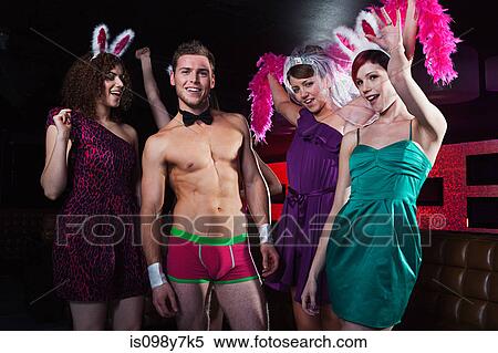 Stock Photography - Young women on hen night with male stripper. Fotosearch