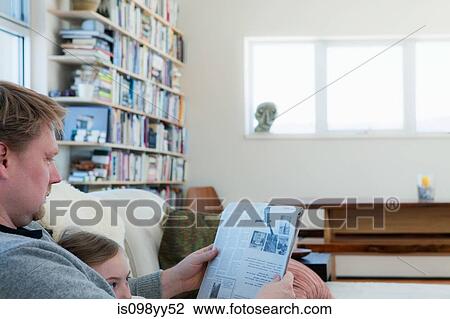 Father and daughter reading newspaper View Large Photo Image Stock Image - Father and daughter reading newspaper. Fotosearch