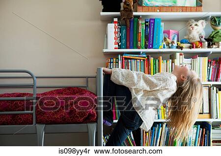 Girl playing on bunkbed View Large Photo Image Stock Photography - Girl playing on bunkbed. Fotosearch
