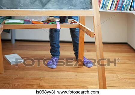 Girl standing behind blackboard View Large Photo Image Stock Image - Girl standing behind blackboard. Fotosearch