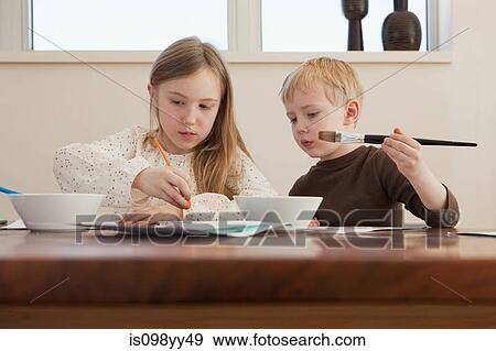 Sister and brother painting pictures View Large Photo Image Stock Photo - Sister and brother painting pictures. Fotosearch