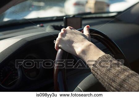 Stock Photograph - Woman driving car. Fotosearch