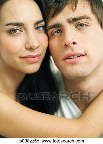 Young couple embracing close-up, portrait View Large Photo Image Stock Image - Young couple embracing close-up, portrait. Fotosearch