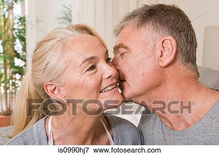 Intimate mature couple View Large Photo Image Stock Photo - Intimate mature couple. Fotosearch
