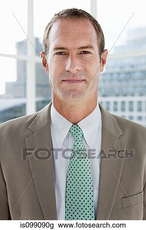 Businessman in office, portrait View Large Photo Image Stock Image - Businessman in office, portrait. Fotosearch