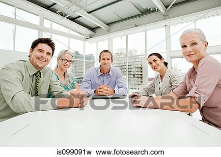 Stock Photo - Five businesspeople meeting in office. Fotosearch