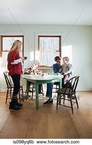 Stock Image - Family having breakfast. Fotosearch