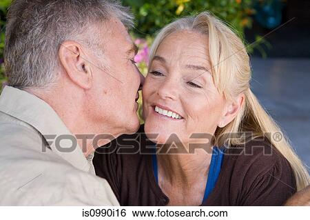 Loving mature couple View Large Photo Image Stock Photograph - Loving mature couple. Fotosearch