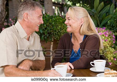 Stock Photography - Mature couple having coffee. Fotosearch