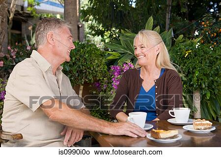Mature couple in cafe View Large Photo Image Picture - Mature couple in cafe. Fotosearch