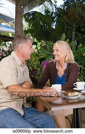 Mature couple in cafe View Large Photo Image Stock Photography - Mature couple in cafe. Fotosearch
