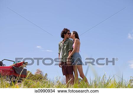 Picture - Affectionate young couple on vacation. Fotosearch