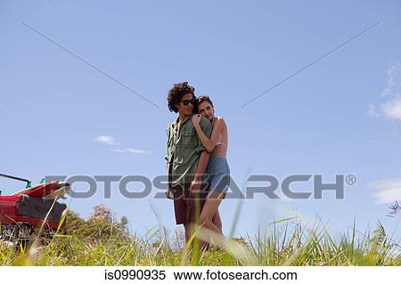 Affectionate young couple on vacation View Large Photo Image Stock Photography - Affectionate young couple on vacation. Fotosearch