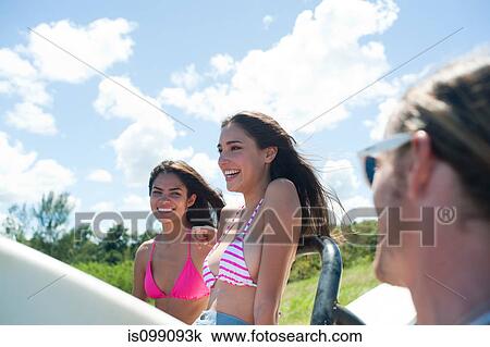 Young women on vacation View Large Photo Image Stock Image - Young women on vacation. Fotosearch