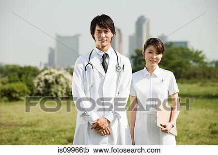 Male doctor and female nurse, portrait View Large Photo Image Stock Image - Male doctor and female nurse, portrait. Fotosearch