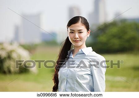 Stock Photograph - Portrait of young businesswoman. Fotosearch