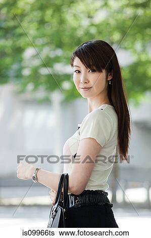 Stock Photograph - Portrait of young businesswoman. Fotosearch