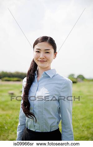 Stock Photography - Portrait of young businesswoman. Fotosearch