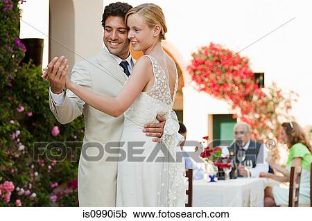 Newlyweds dancing at wedding reception View Large Photo Image Stock Image - Newlyweds dancing at wedding reception. Fotosearch