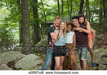Portrait of friends in forest View Large Photo Image Stock Photo - Portrait of friends in forest. Fotosearch