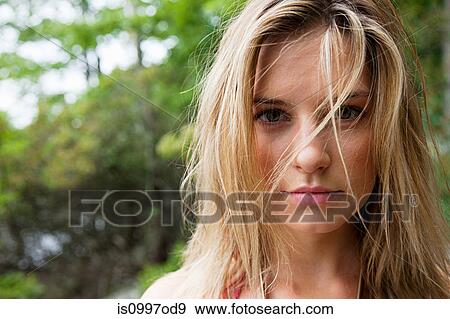 Stock Photo - Portrait of young blonde woman. Fotosearch