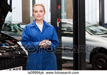 Stock Image - Apprentice mechanic, portrait. Fotosearch