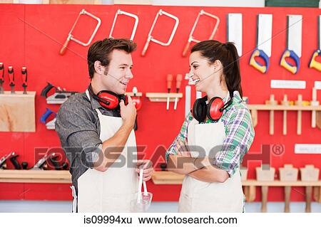 Carpenters in front of wood work tools View Large Photo Image Stock Photograph - Carpenters in front of wood work tools. Fotosearch